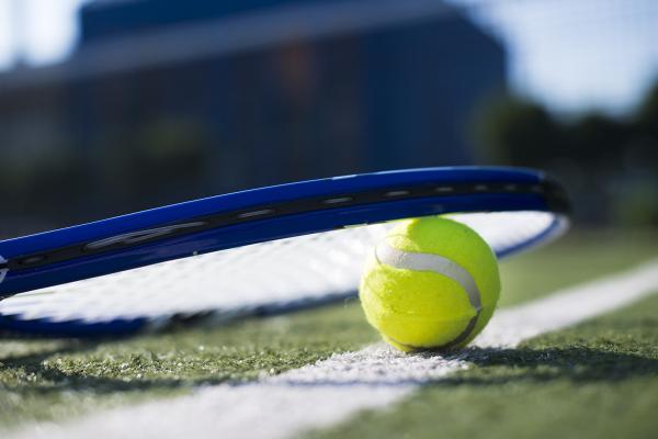 Tennis racket and ball