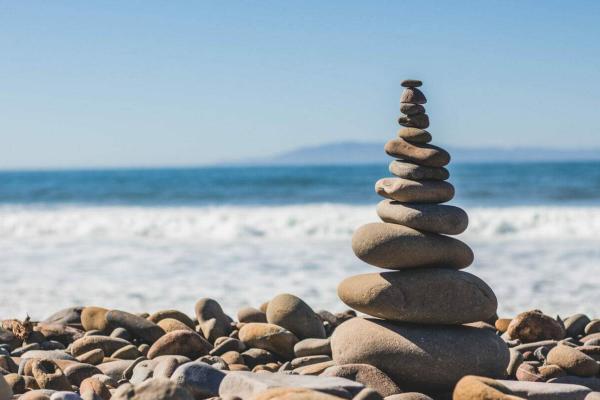A balanced pile of rocks to represent mental health and personal balance